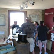 People on a tour in the Colonel Davenport House